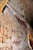 Bagan Myanmar. Sulamani temple. Large painted reclining Buddha. 